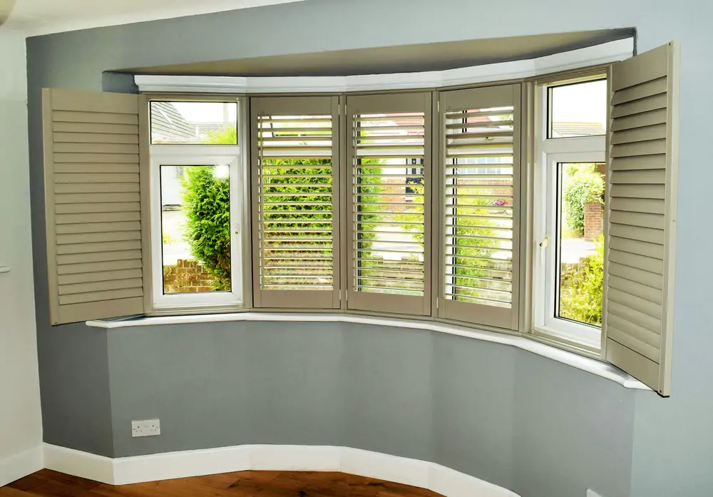 Bay+window+wooden+shutters